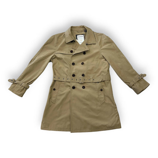 A beige trench coat with a double-breasted button-up front and a collar.