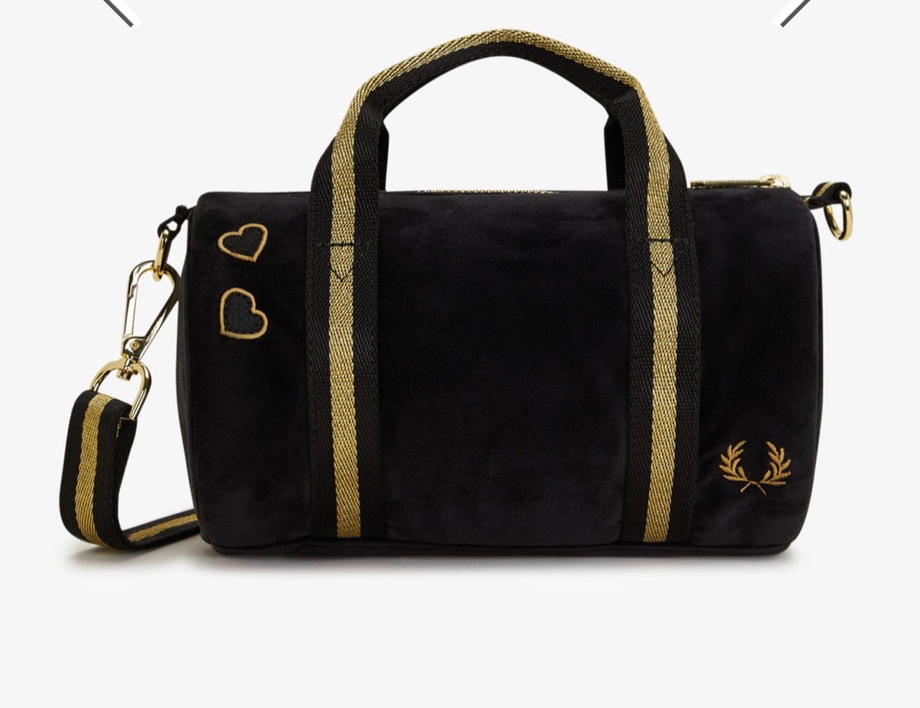 Black duffel bag with gold accents on a white background