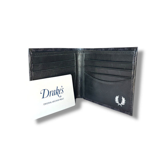Black leather wallet with a card holder on a white background