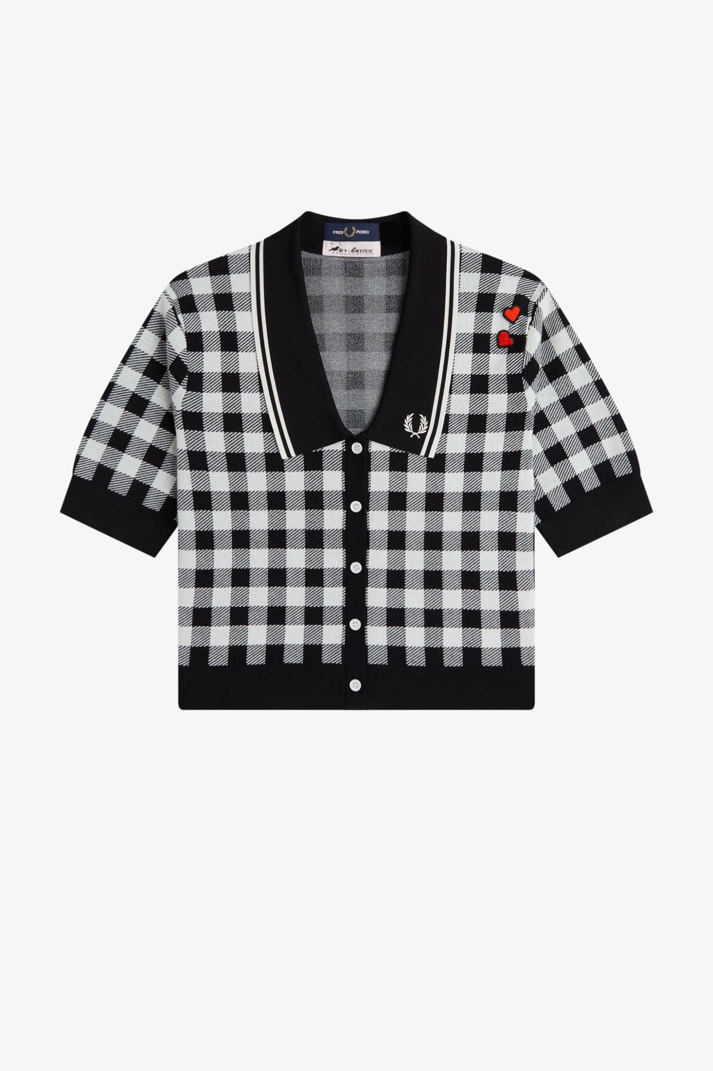 Black and white checkered cardigan with a brand logo on a white background
