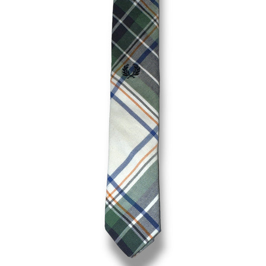 Plaid tie with green, blue, and white pattern on a white background