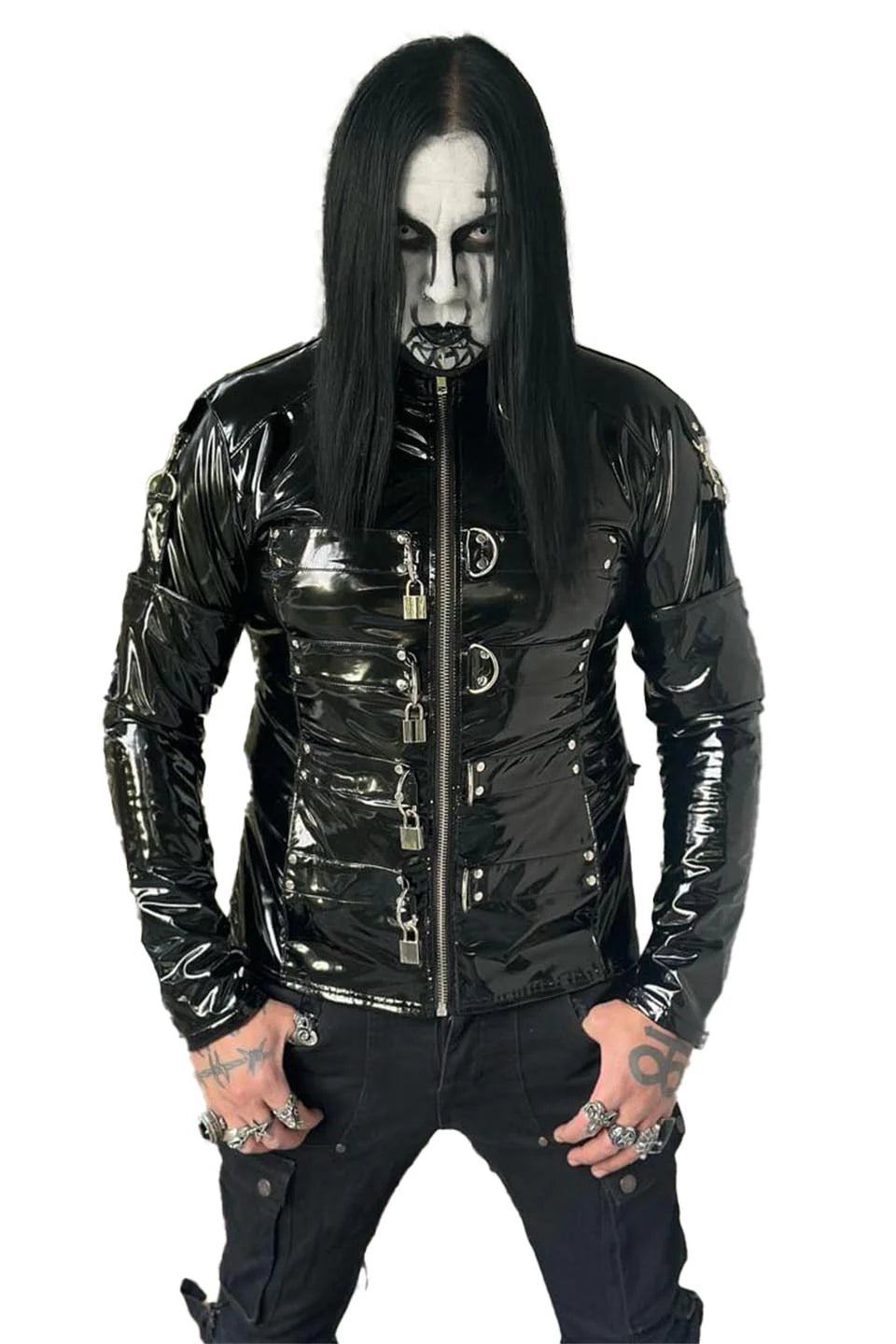 Person wearing a black, glossy jacket with metallic accents on a white background