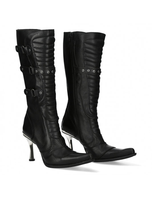 Black knee-high boots with high heels on a white background