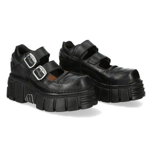 Black platform shoes with buckles on a white background