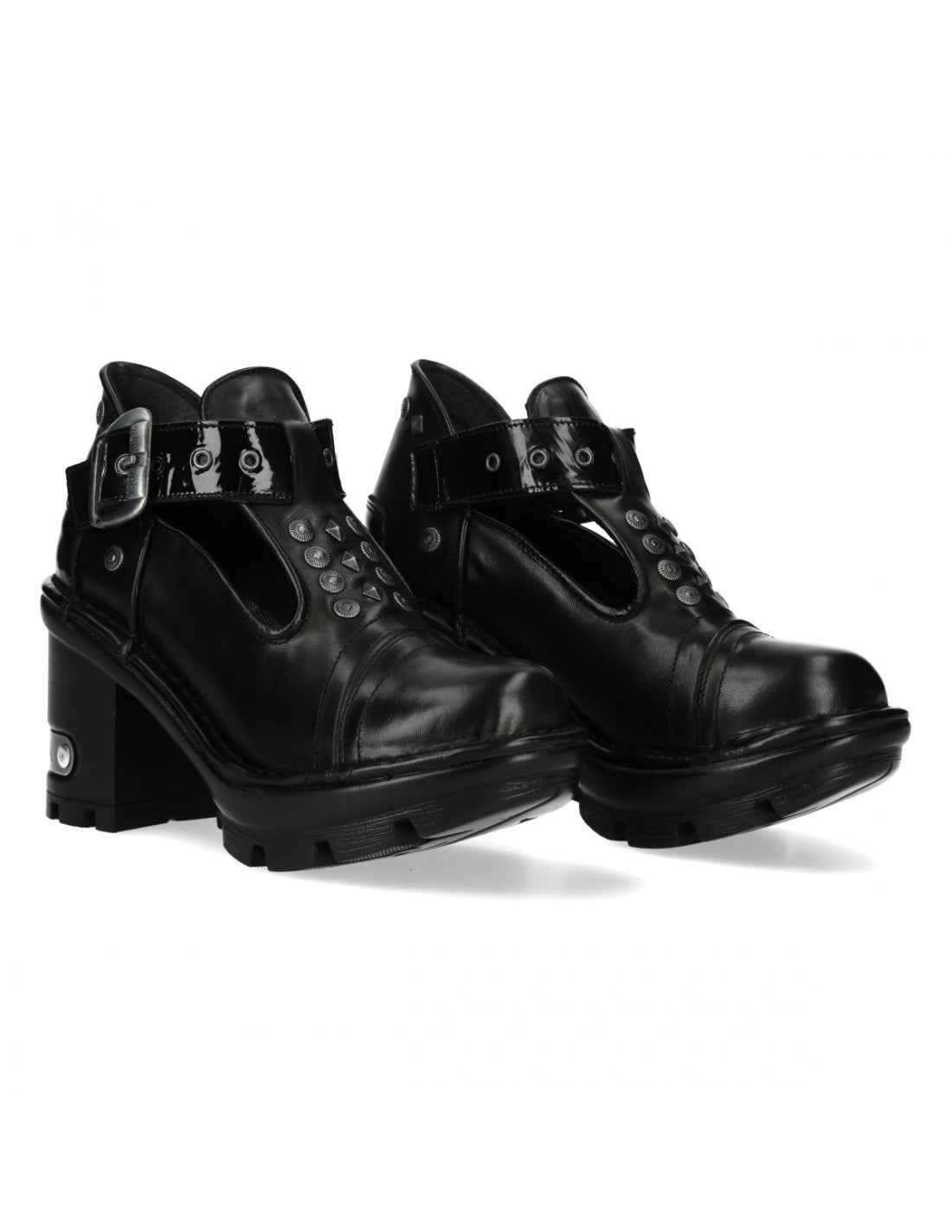 Pair of black leather boots with buckles on a white background