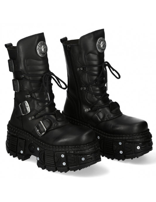 Pair of black combat boots with buckles on a white background