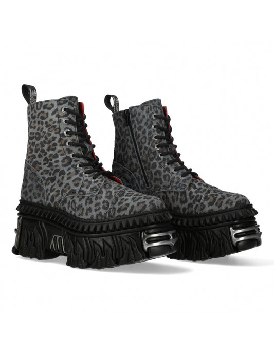 Pair of gray leopard print boots with black soles on a white background