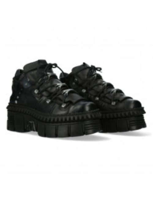 Black high-top sneakers on a white background