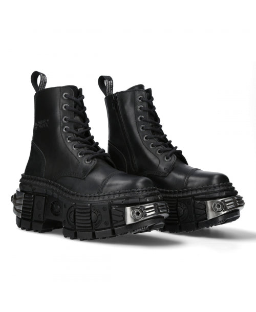 Pair of black combat boots with unique sole design on a white background