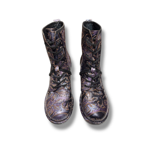 Pair of patterned boots on a white background
