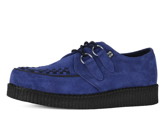 Blue suede shoe with a thick black sole on a white background