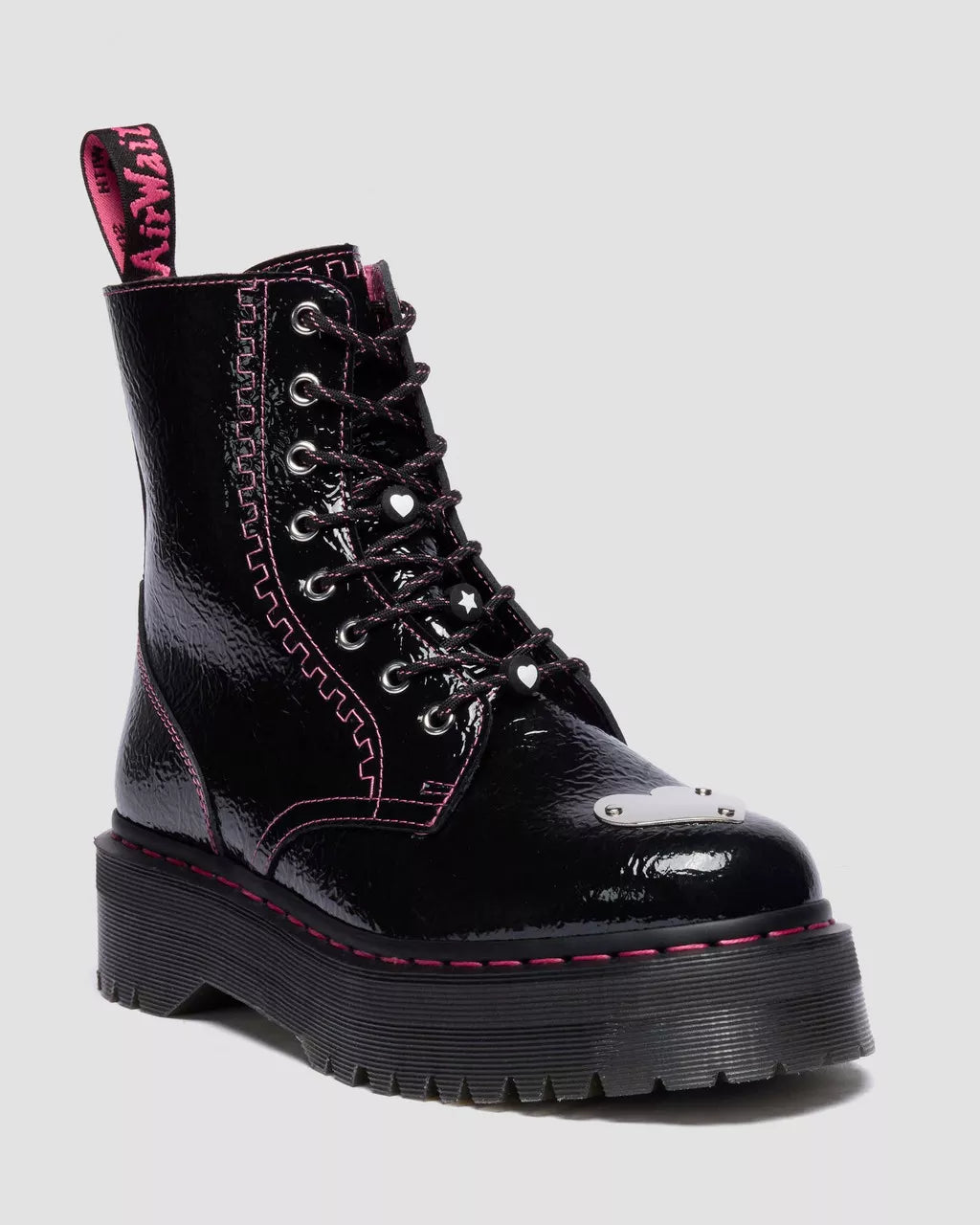Black leather boot with pink laces on a white background
