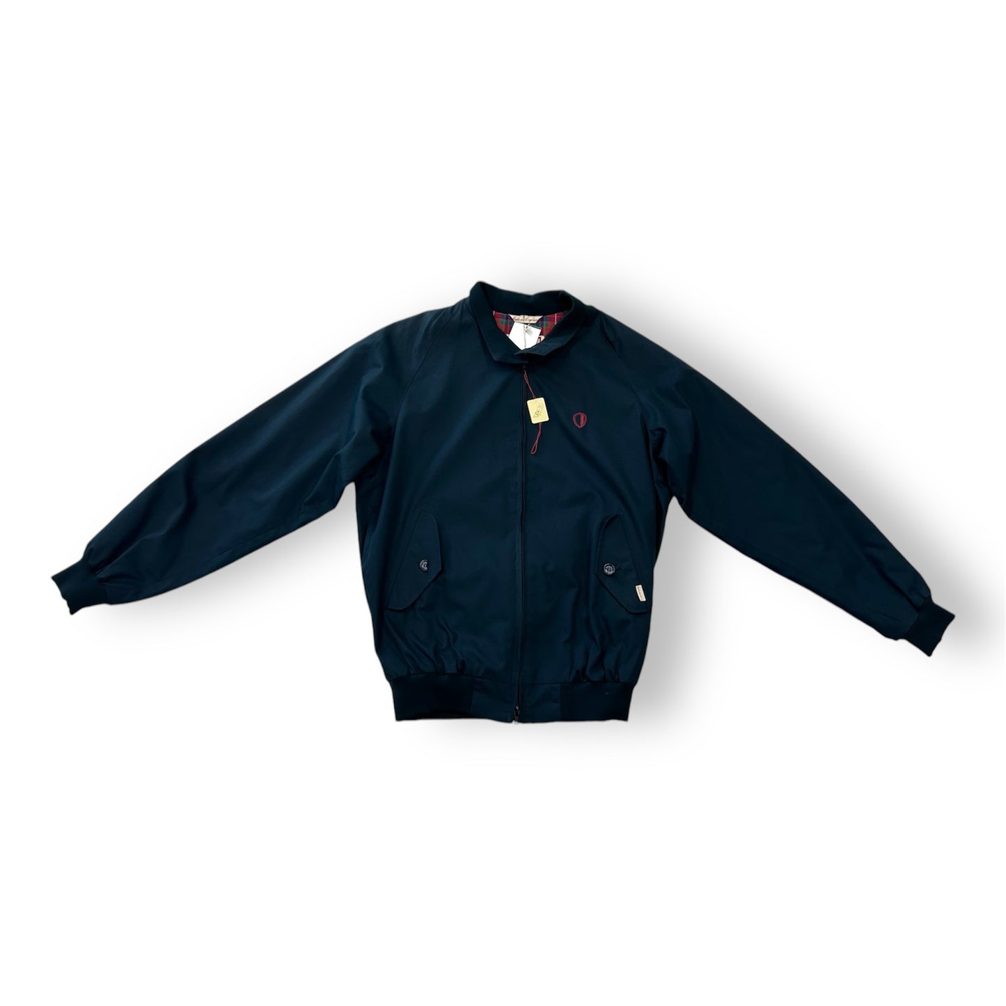 A navy blue Baracuta Harrington jacket with a front zipper and a logo patch on the left sleeve.