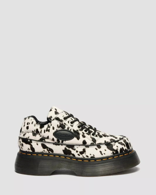 Black and white patterned sneaker on a light gray background