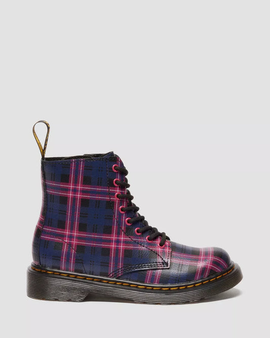 Plaid patterned boot with pink accents on a light gray background