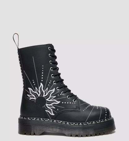 Black boot with white floral design on a gray background