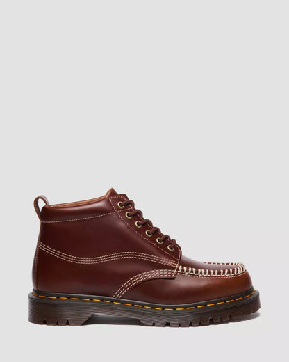 Brown leather boot with a white background