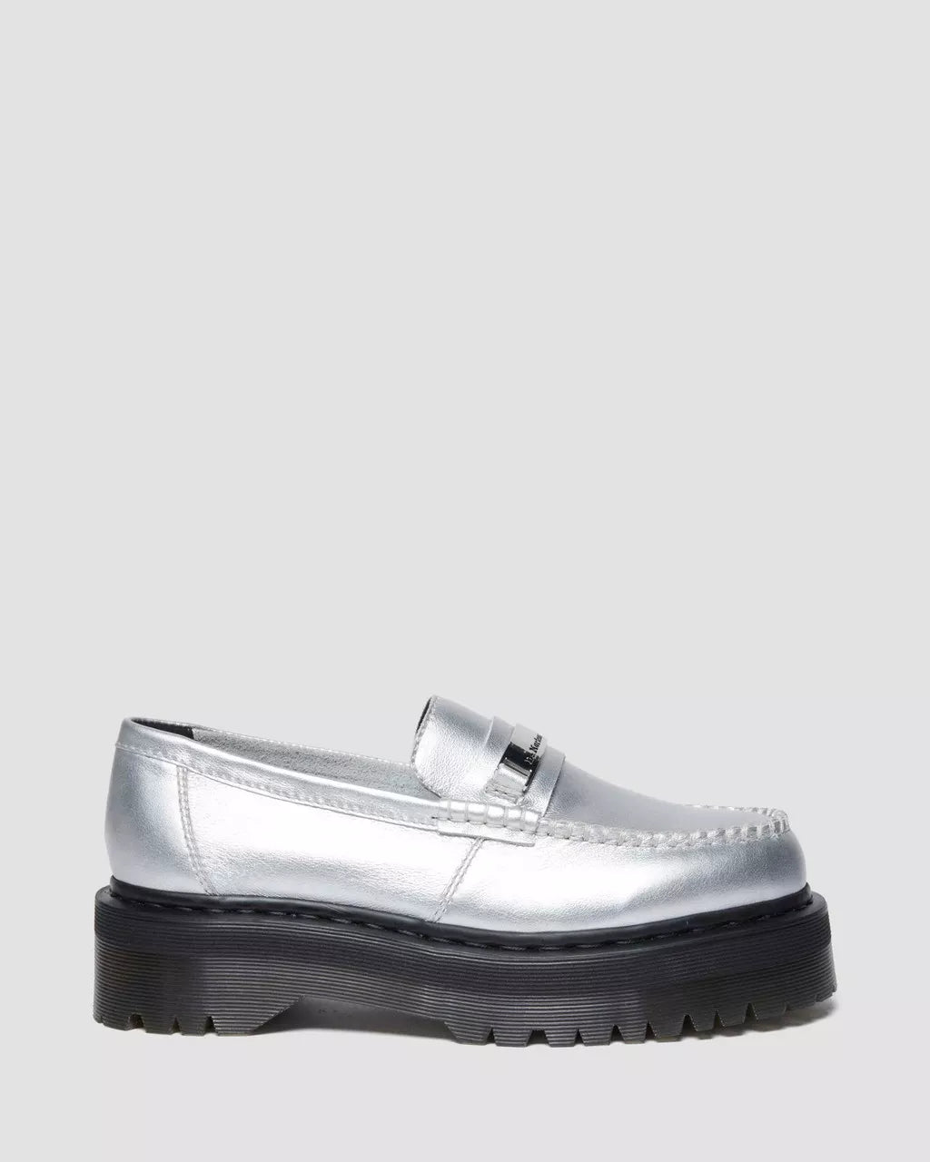 A silver metallic leather loafer with a lace-up closure and a chunky tread sole.