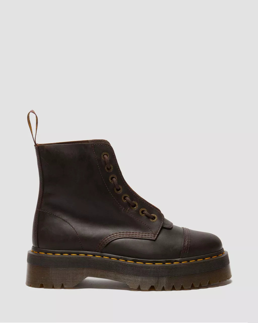 A Sinclair Crazy Horse leather platform boot with a dark brown color and lace-up front.