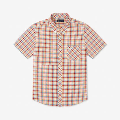 A short-sleeve button-up shirt with a red, blue, and white plaid pattern, featuring a single chest pocket, laid flat against a light gray background.