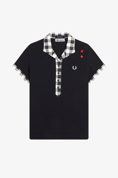 Black polo shirt with checkered collar and sleeve trim on a white background