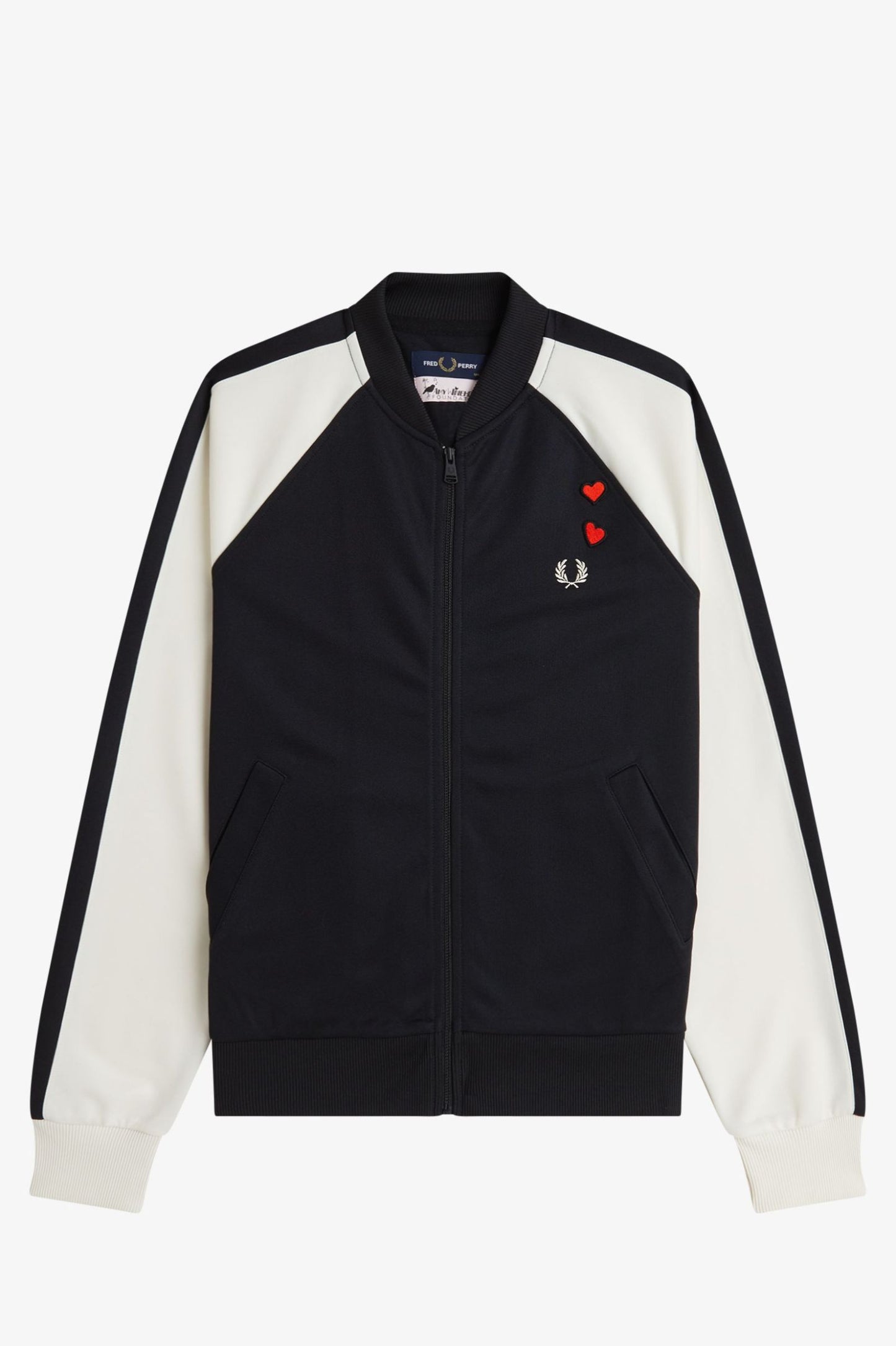 Black and white track jacket with brand logo on a light gray background