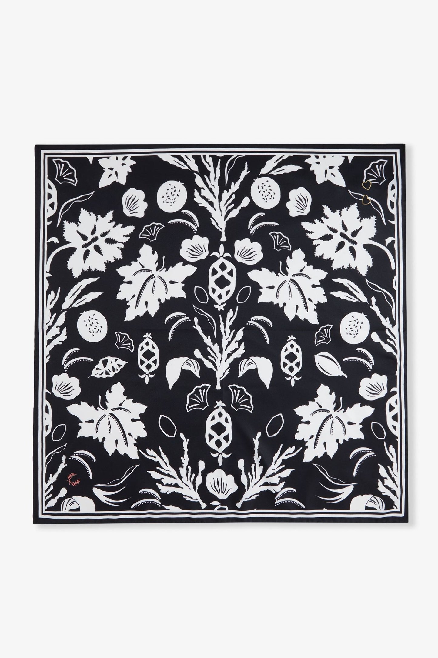 Black square with white floral pattern