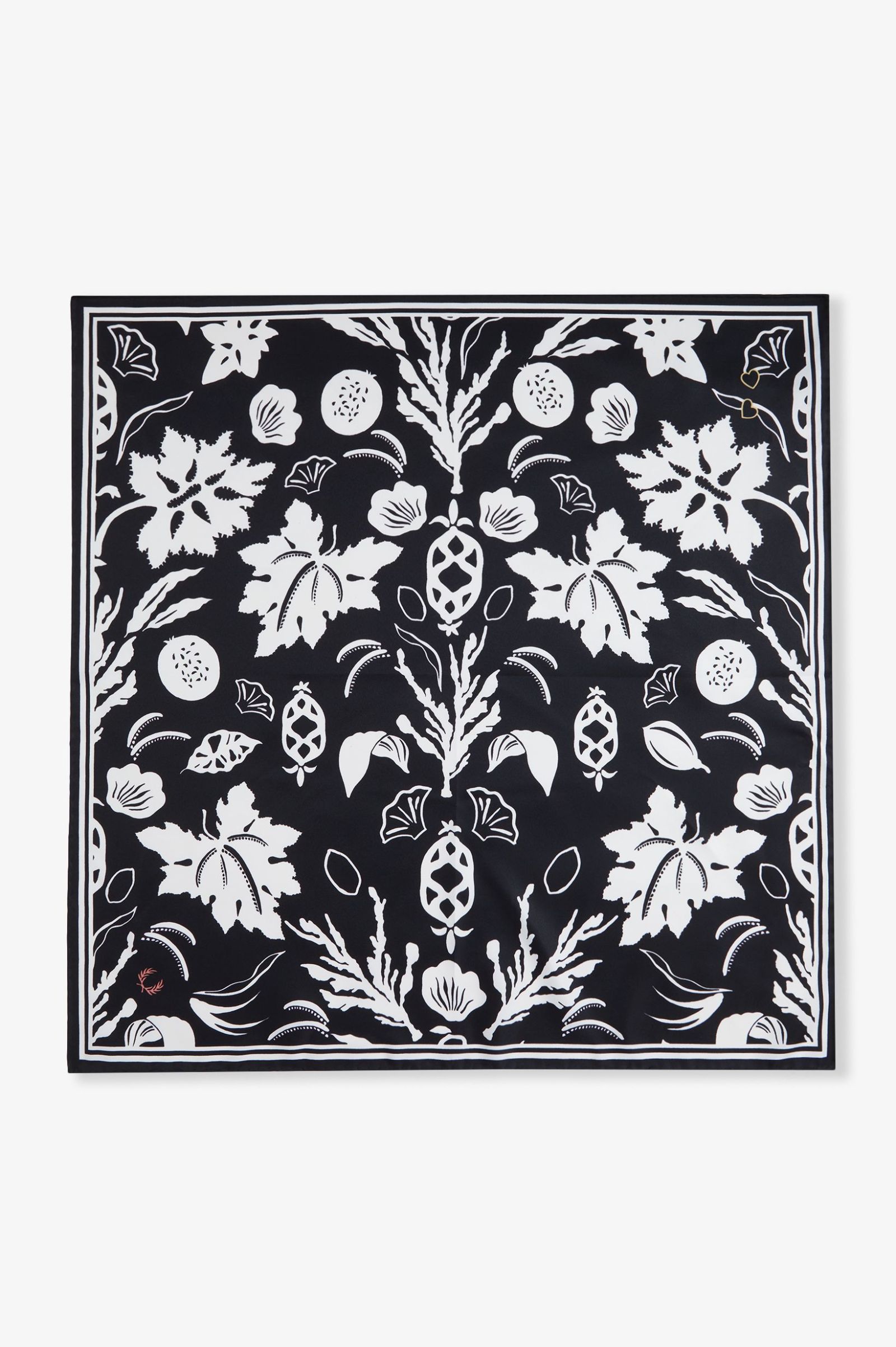 Black square with white floral pattern