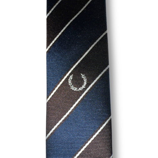 A necktie with a striped pattern featuring black and chocolate brown colors, with a logo in the center.