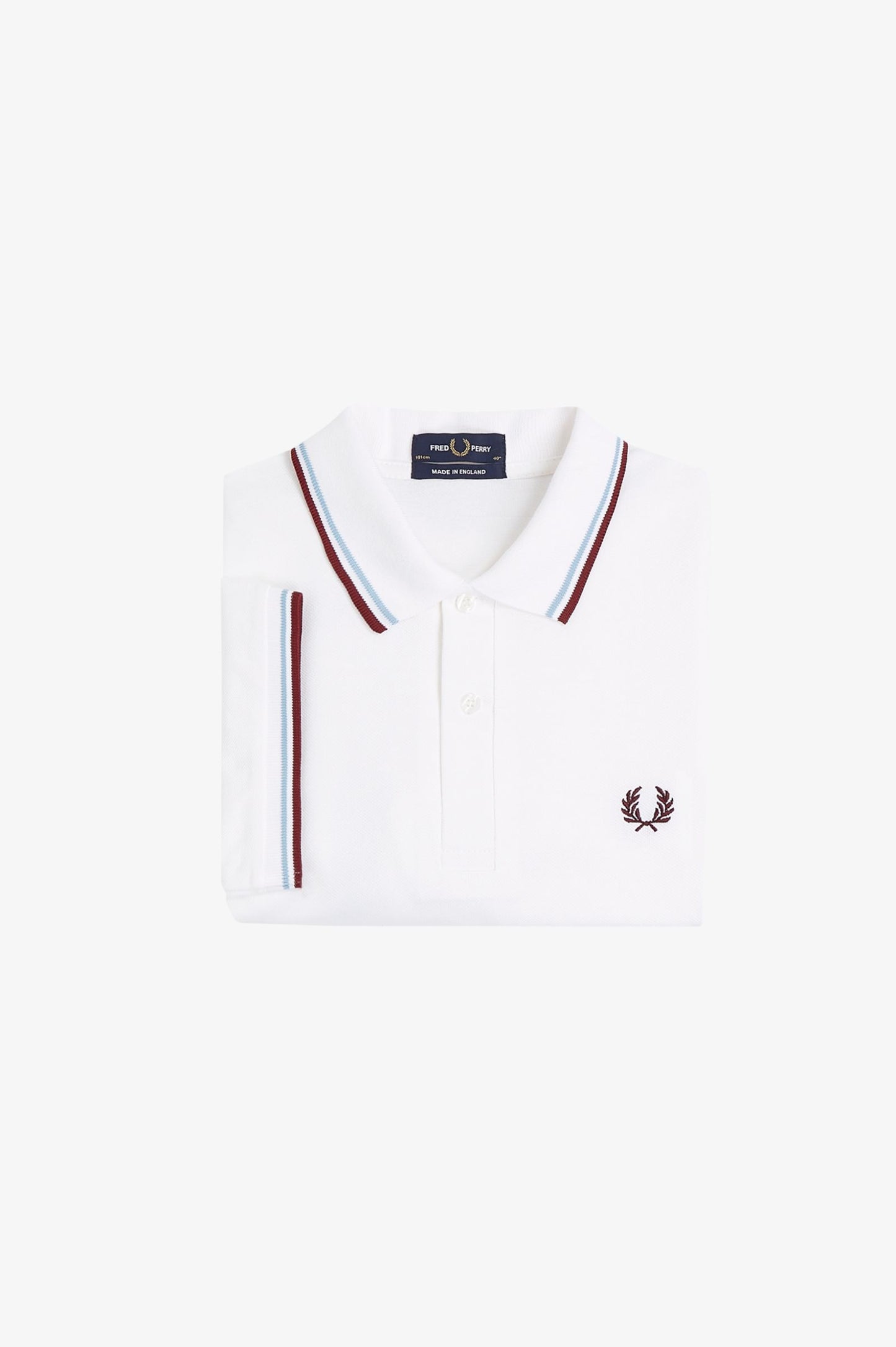 White polo shirt with red and blue trim on a white background