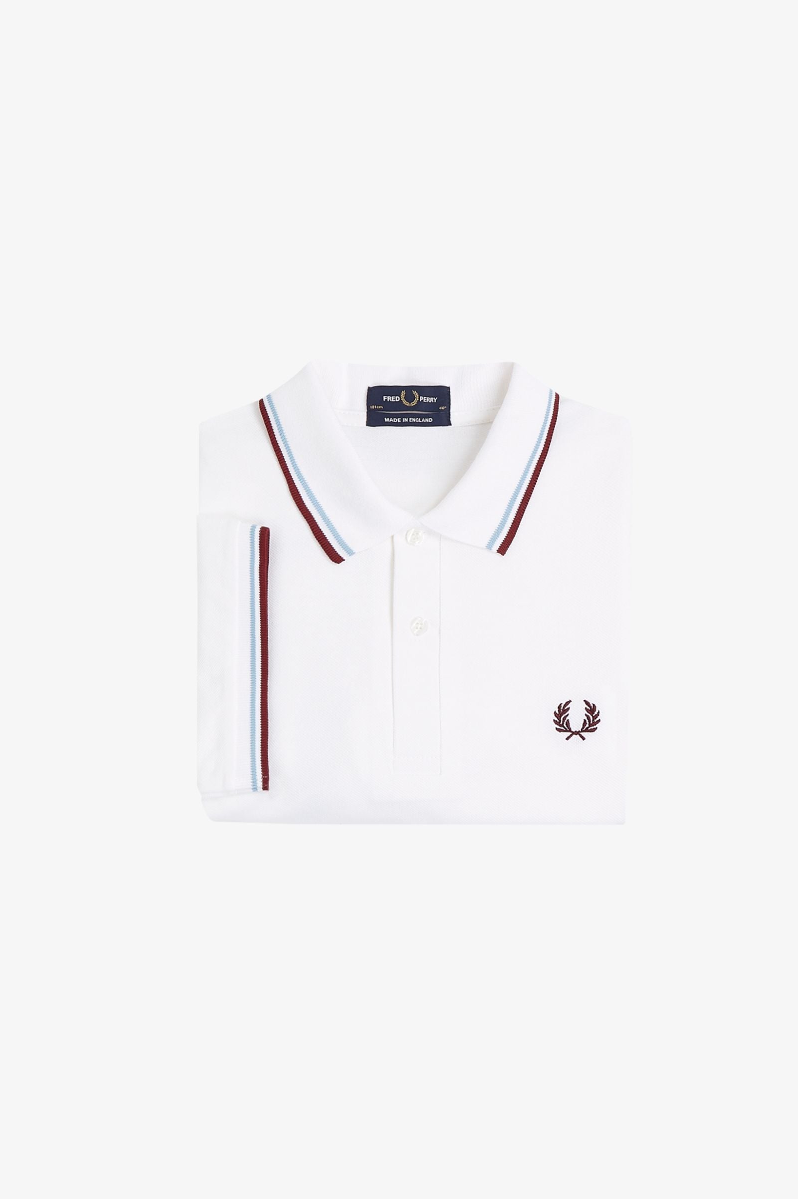 White polo shirt with red and blue trim on a white background
