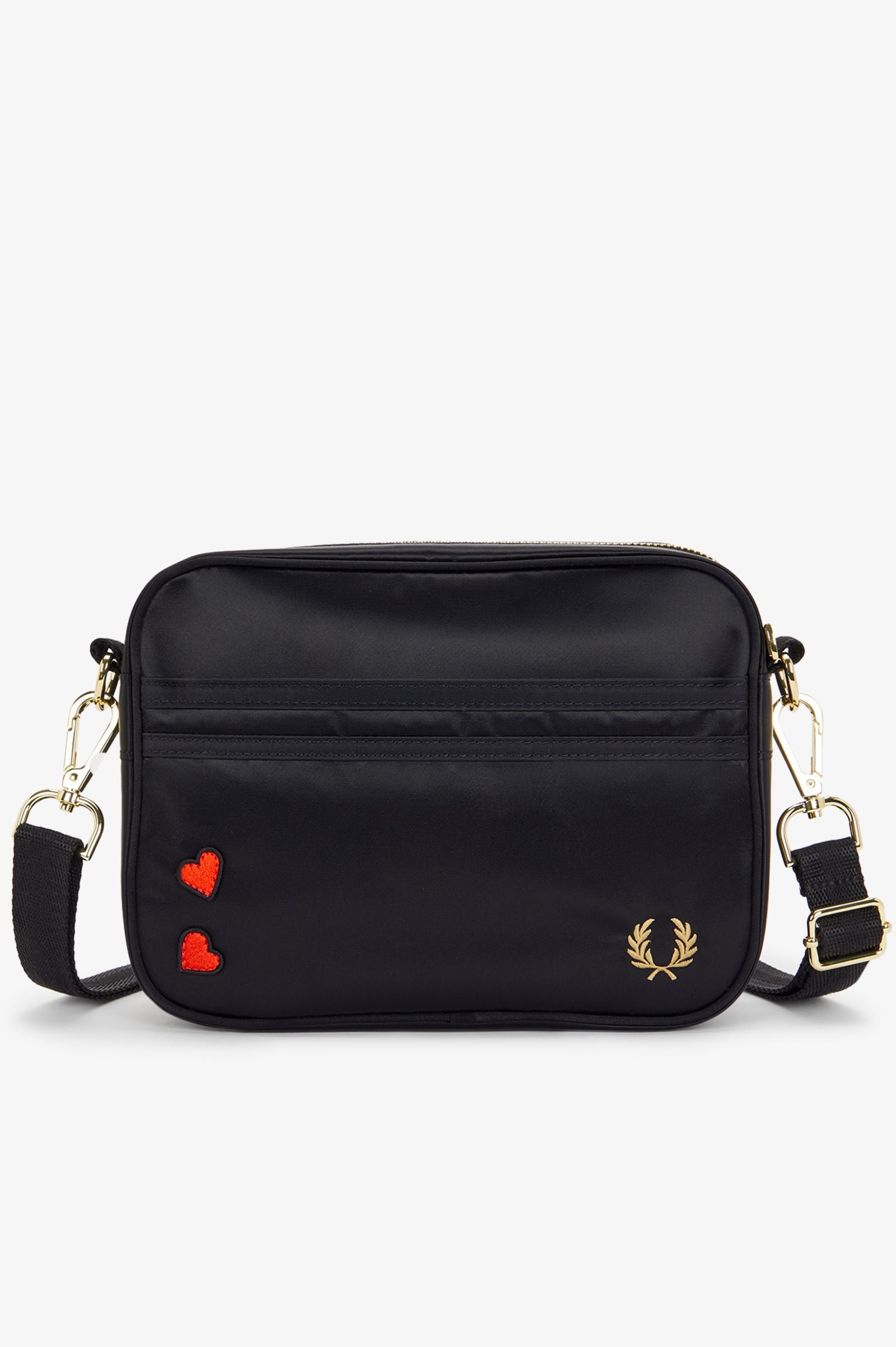Black handbag with heart designs and a brand logo on a white background