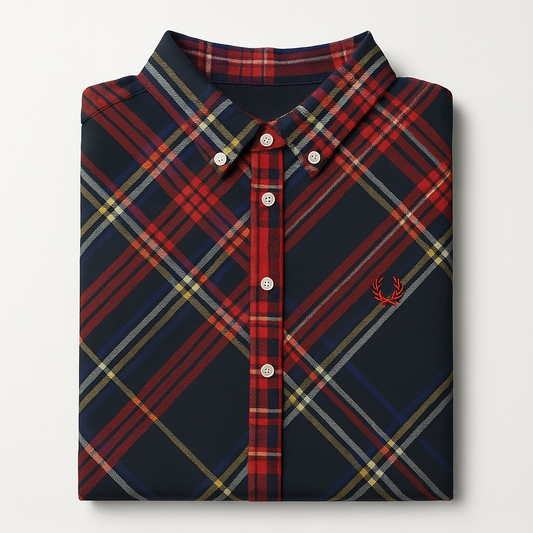 Folded plaid shirt with a logo on a light gray background