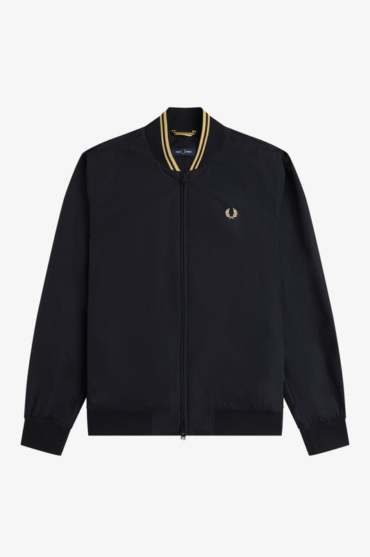 Black bomber jacket with gold accents on a white background