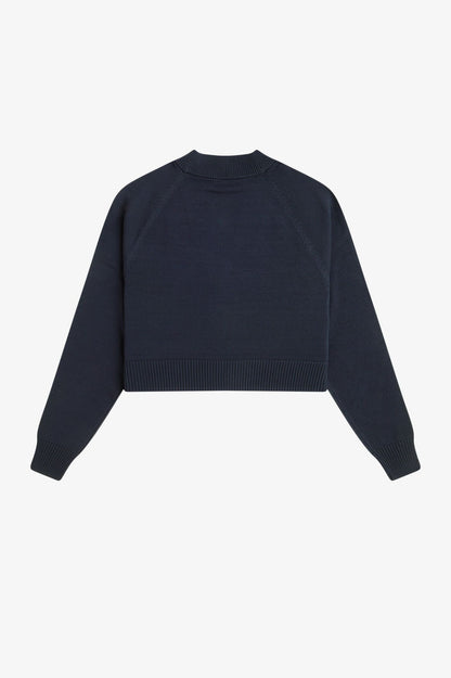 Navy blue sweater on a light gray background
