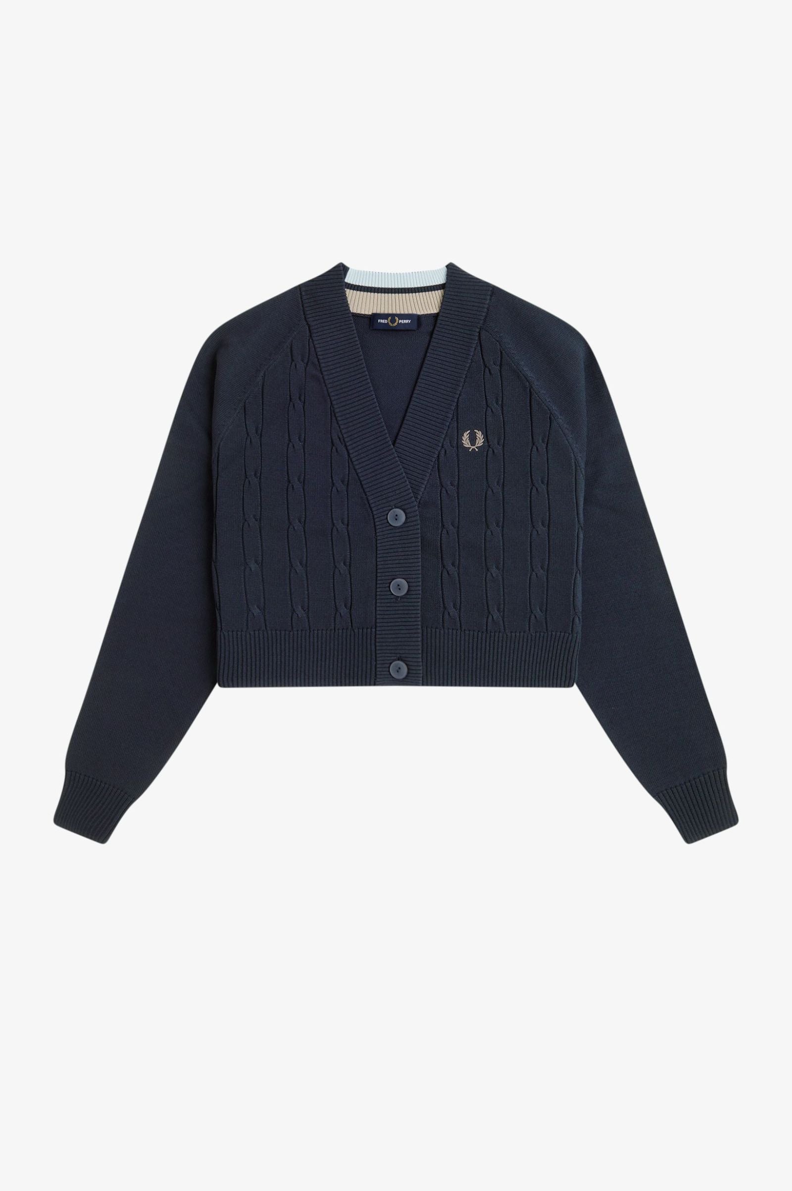Navy cardigan with brand logo on a light gray background