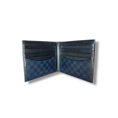 Open blue and black checkered wallet on a white background