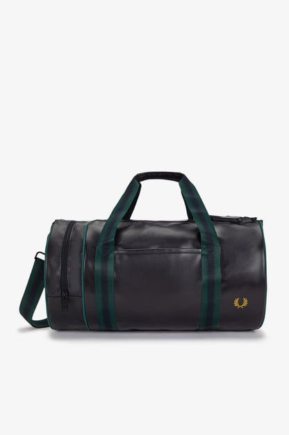 Black duffel bag with green straps on a white background