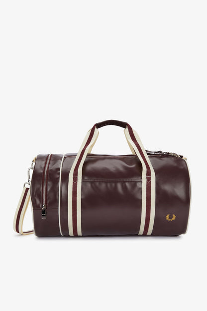 Brown duffel bag with white stripes on a white background