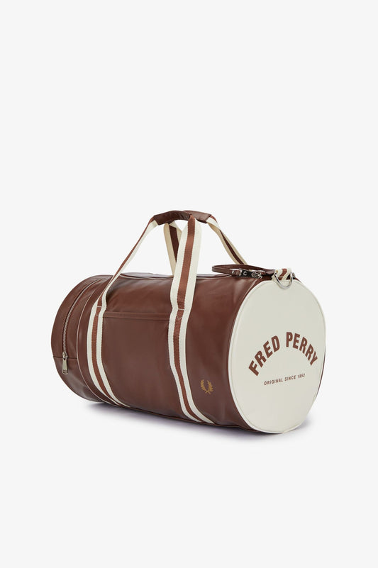 Brown and white duffel bag with 'Fred Perry' branding on a white background