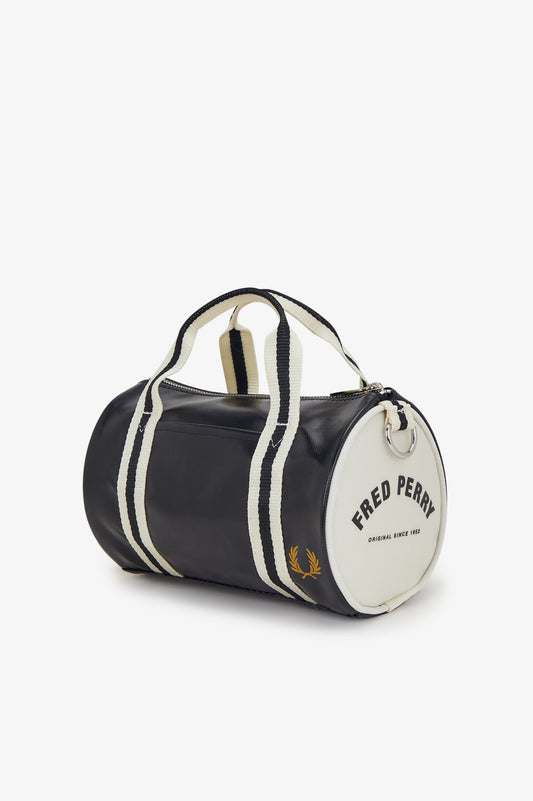 A Fred Perry Classic Mini Barrel Bag with black and white colors, featuring the brand's logo.