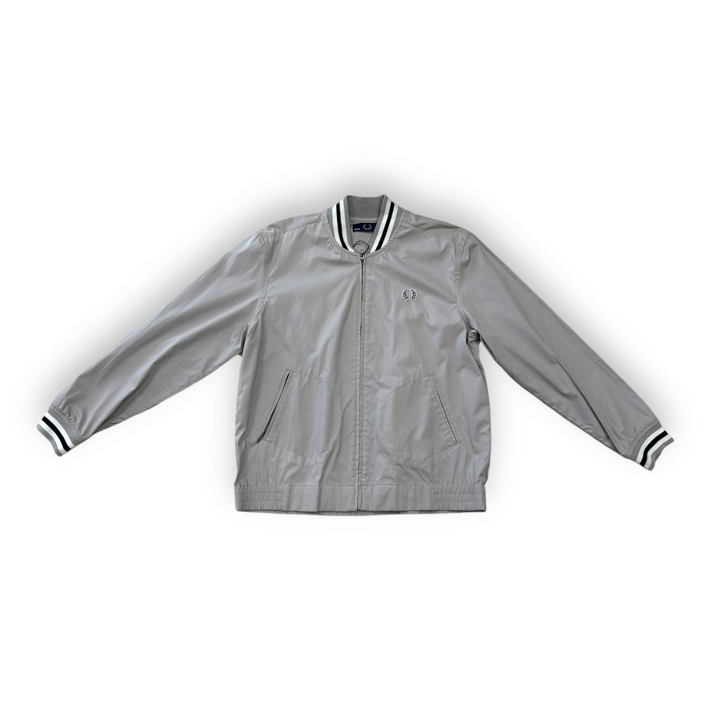 A silver Fred Perry Classic Tennis Bomber jacket with black and white stripes on the sleeves.