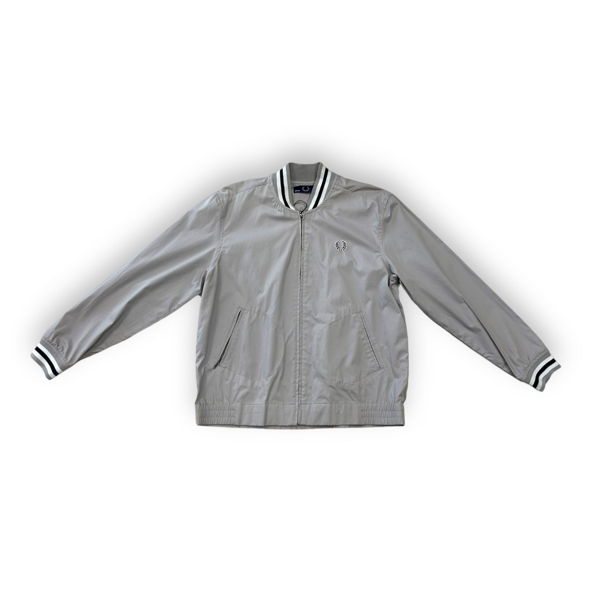 A silver Fred Perry Classic Tennis Bomber jacket with black and white stripes on the sleeves.