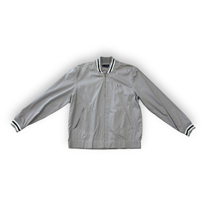 A silver Fred Perry Classic Tennis Bomber jacket with black and white stripes on the sleeves.