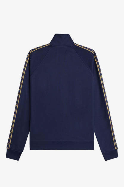 Navy blue jacket with gold and white striped sleeves on a light gray background