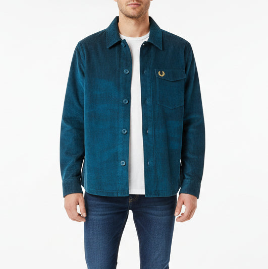 Blue denim shirt on a white background