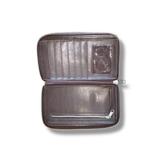 Brown leather wallet with zipper on a white background