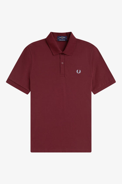 Maroon polo shirt with a small logo on a white background