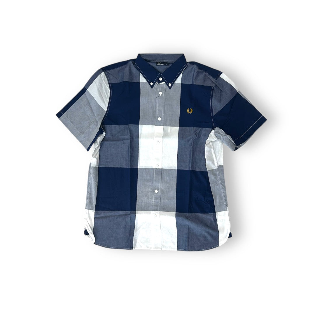 A sleeved Fred Perry Magnifeld Blue shirt with a striped pattern, featuring a collar and button-up neck.