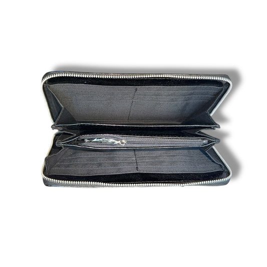 Open black leather wallet on a white background
